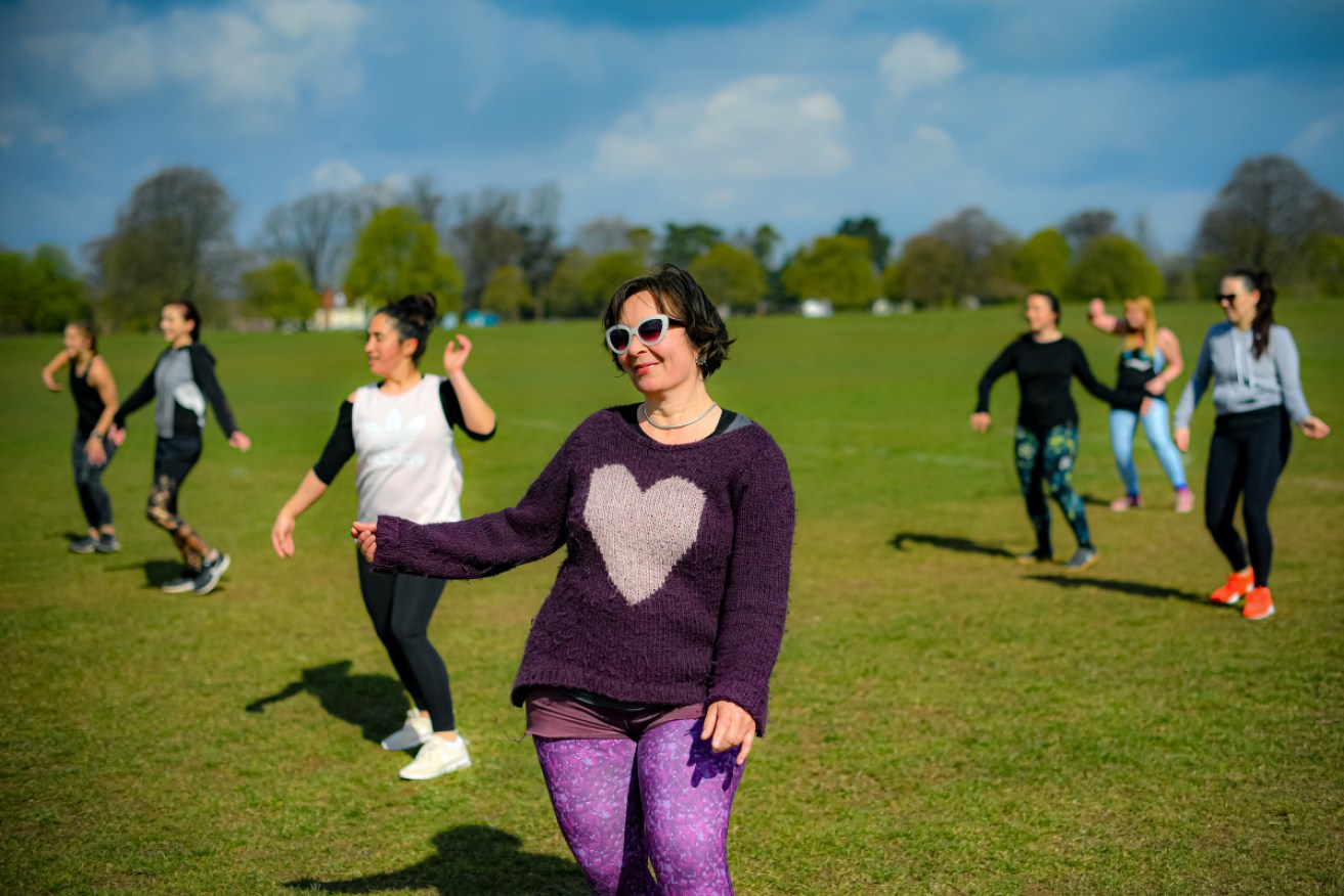 People take part in an outdoor AfroFusion dance exercise class on The Downs, Clifton, Bristol, following the easing of England's lockdown restrictions.