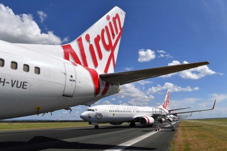 Virgin cancels Melbourne flights amid virus crisis