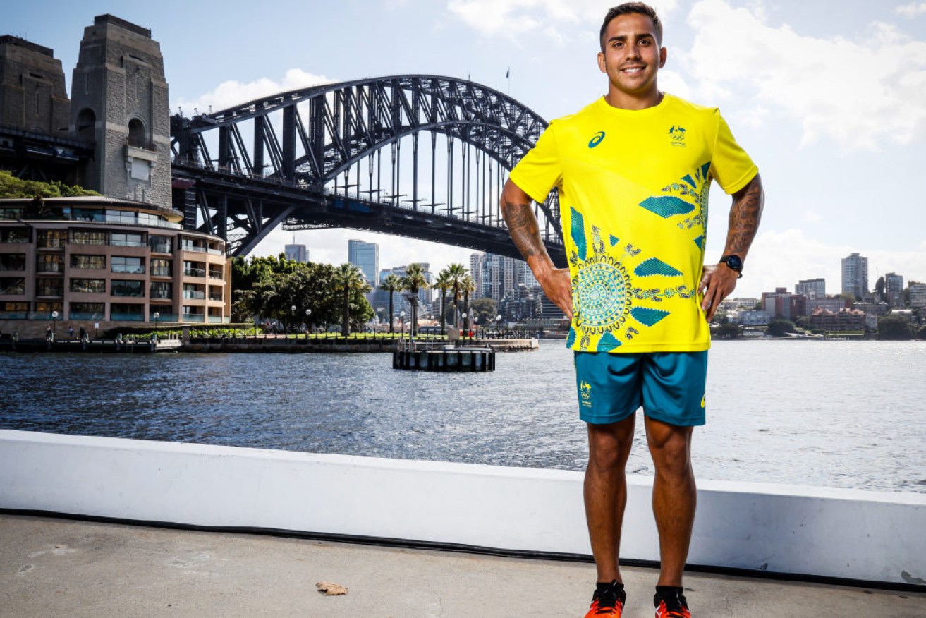 Maurice Longbottom models the Australian Olympic Team Tokyo 2020 uniform. 