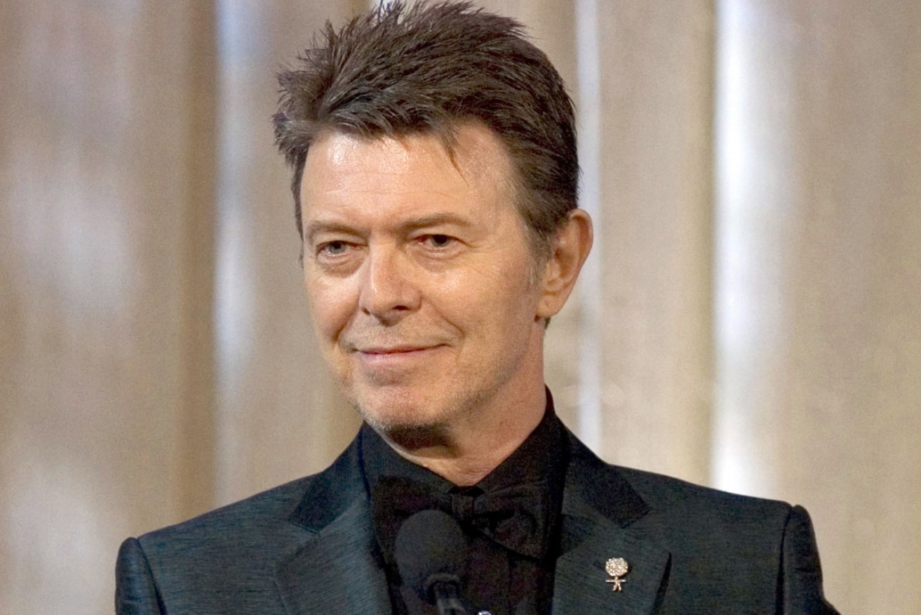 A guitar belonging to David Bowie and signed with the words Major Tom is going up for auction.