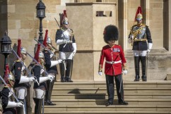 Hidden snapper caught close-ups at royal funeral