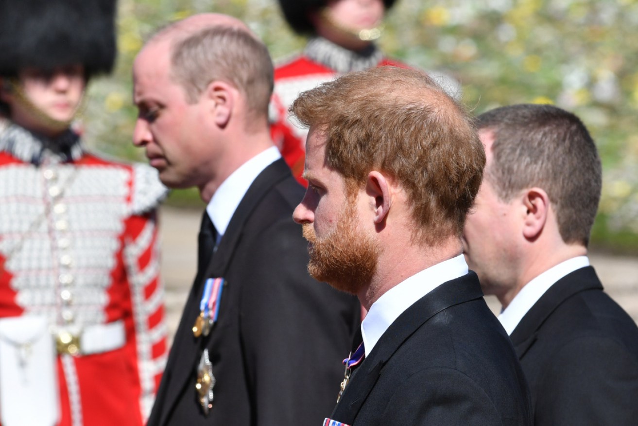 Prince Harry and his brother William walk behind their grandfather's coffin at last Saturday's funeral.