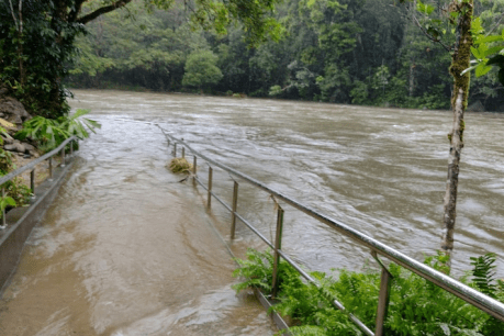 Dozens of emergency calls as half-a-metre of rain falls in Cairns