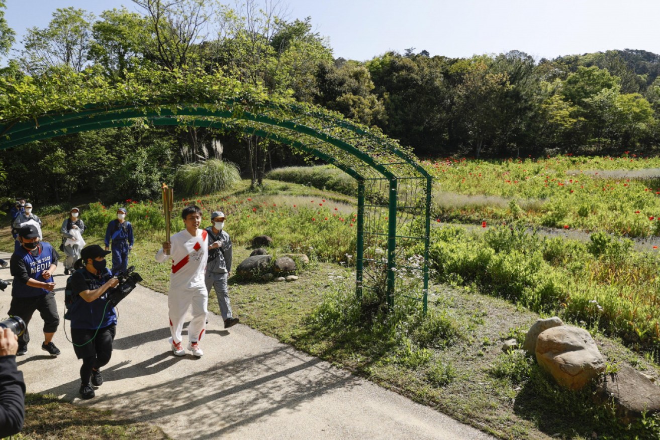 Some legs of the Tokyo Olympic torch relay have been taken off the public streets.