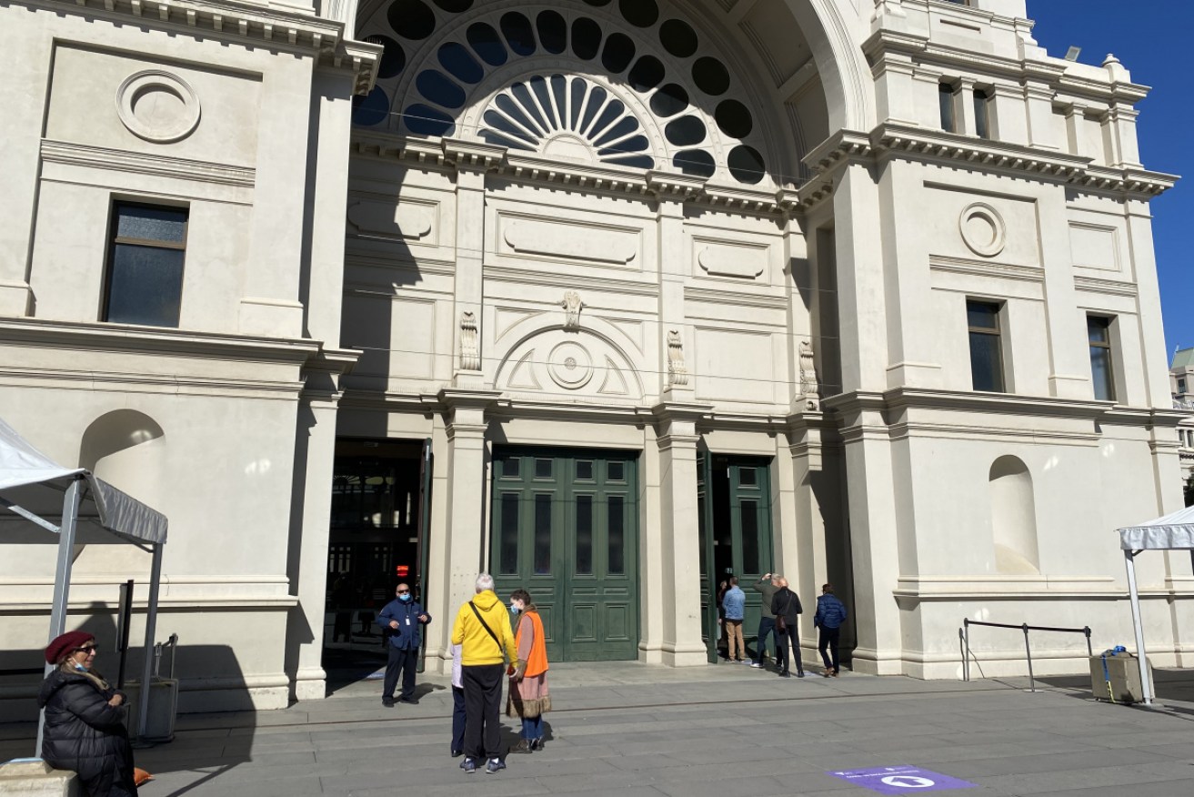 Melburnians trickled into Victoria's newly opened mass vaccination hub at the Royal Exhibition Building on Wednesday.