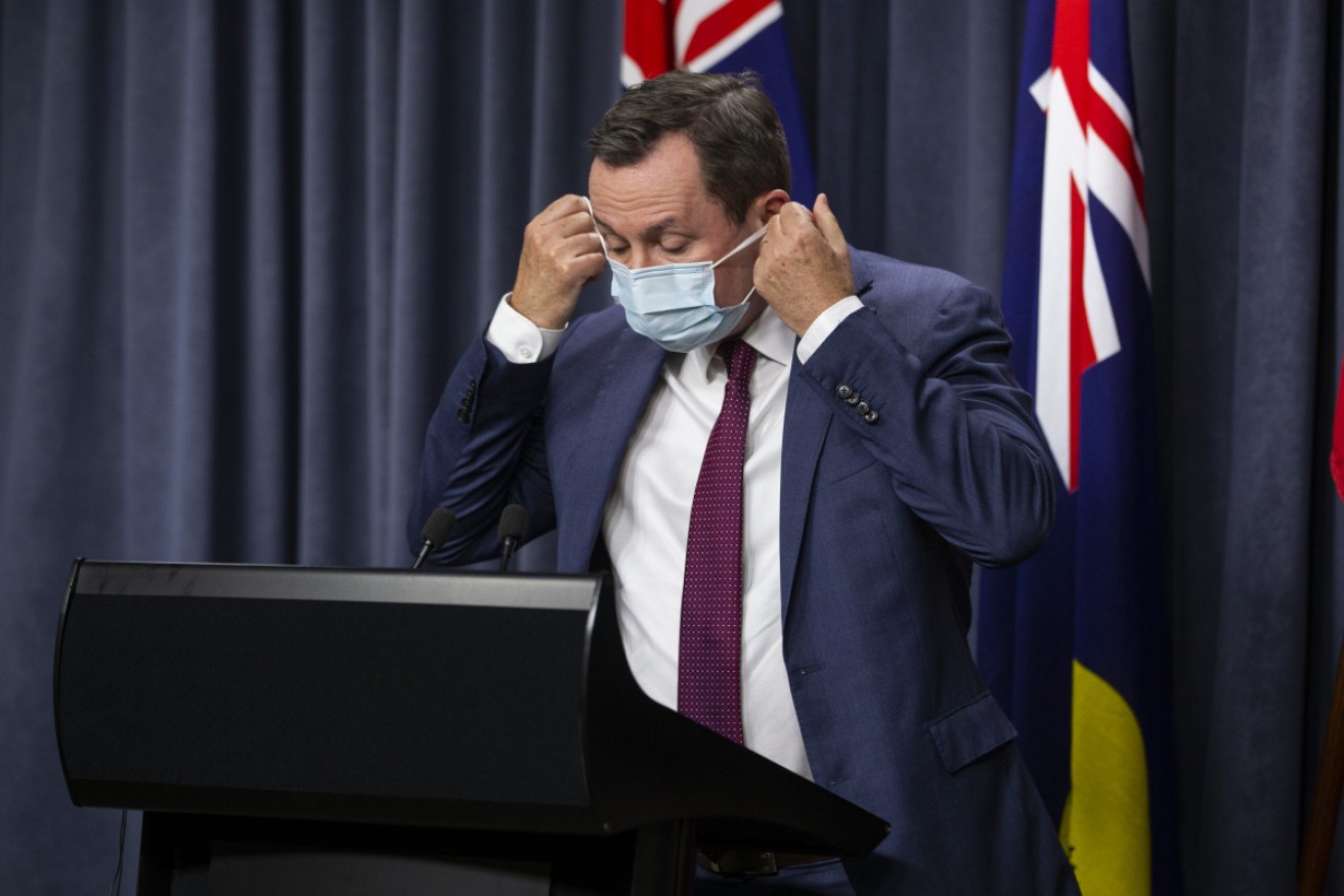 Masks will remain mandatory inside in Perth and Peel for another week.