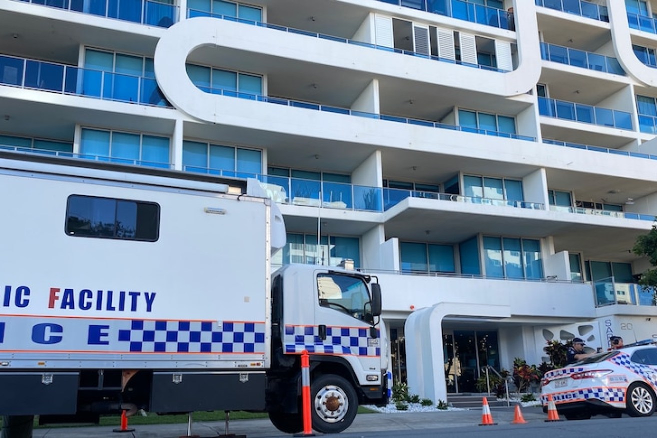 Police and forensic services at a Labrador apartment on the Gold Coast where two bodies were found yesterday.