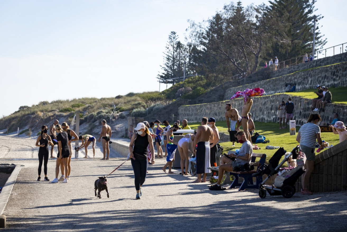 Locals at Perth's Cottlesoe beach on Sunday.