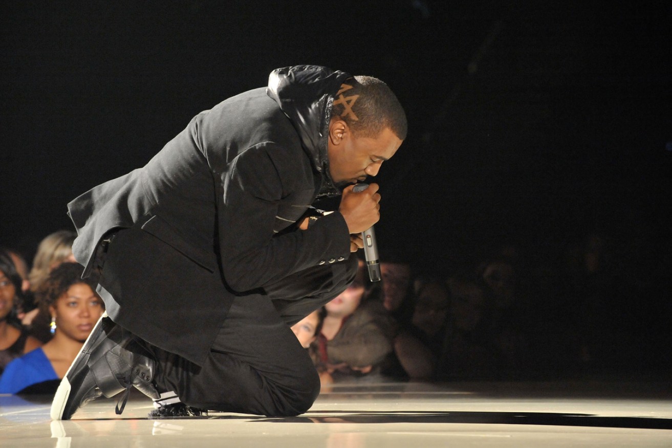 West, wearing his Yeezy sneakers, performs at the 2008 Grammy Awards.