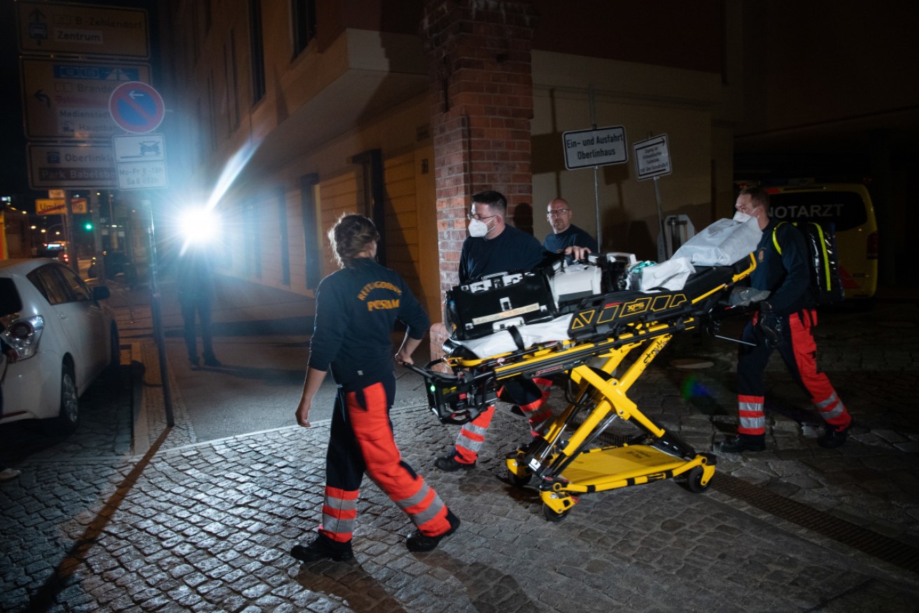Paramedics leave the Oberlin Clinic, in Potsdam, near Berlin.
