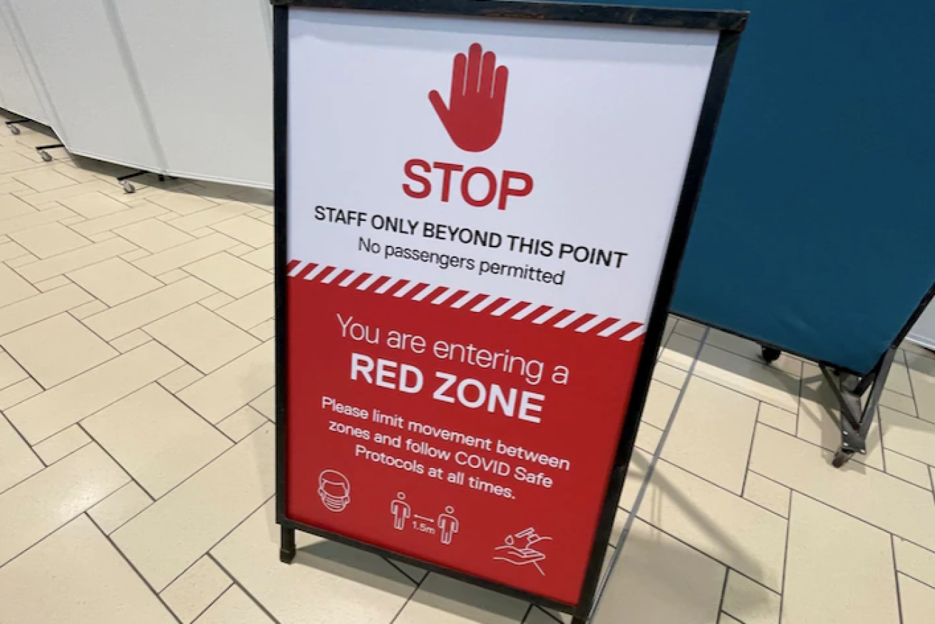 All international travellers must stay in Brisbane International Airport's "red zone", except passengers from New Zealand.