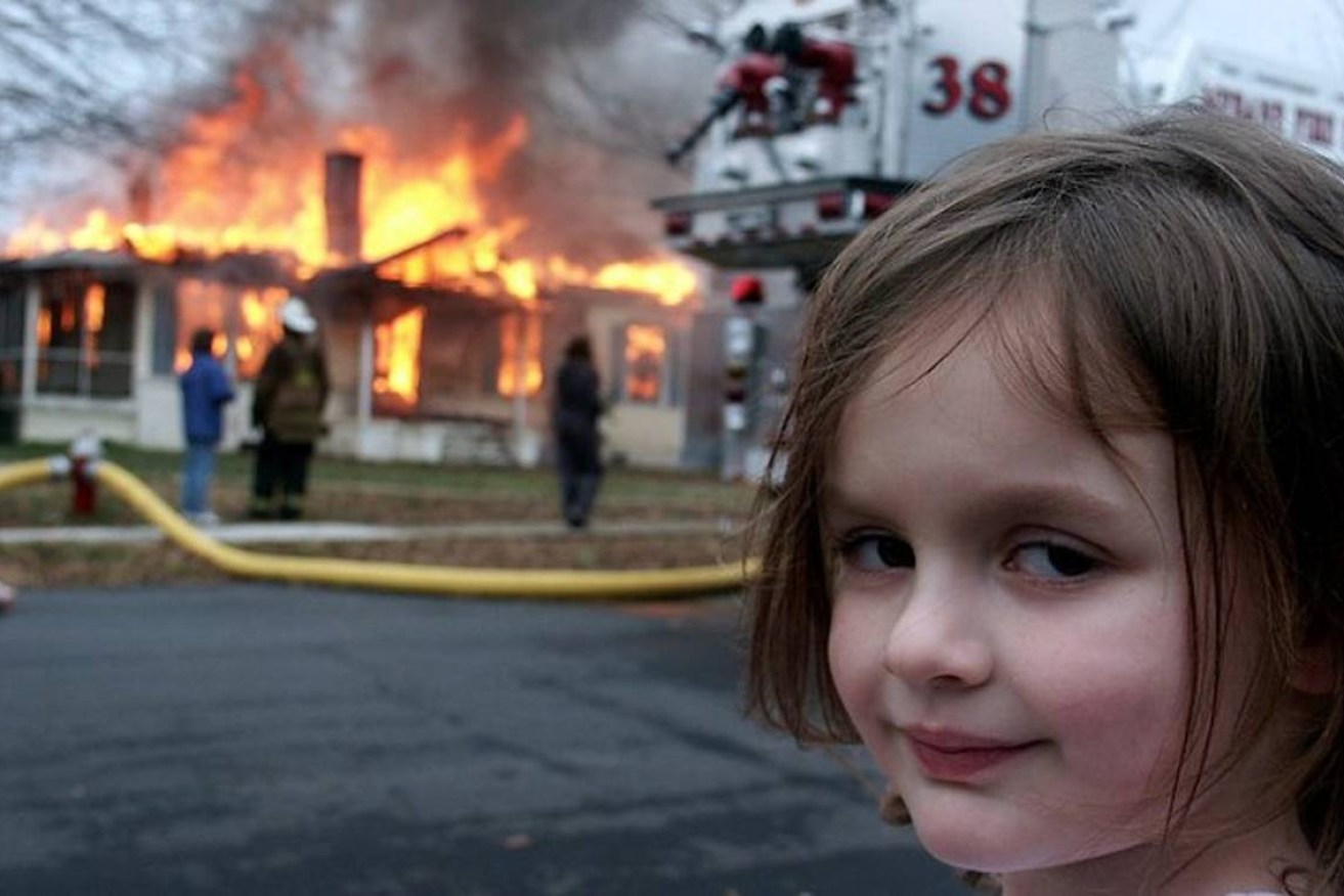 A 5-year-old Zoë Roth shot to internet fame after her father took this image of her smiling in front of a controlled burn of a house in her North Carolina neighbourhood.