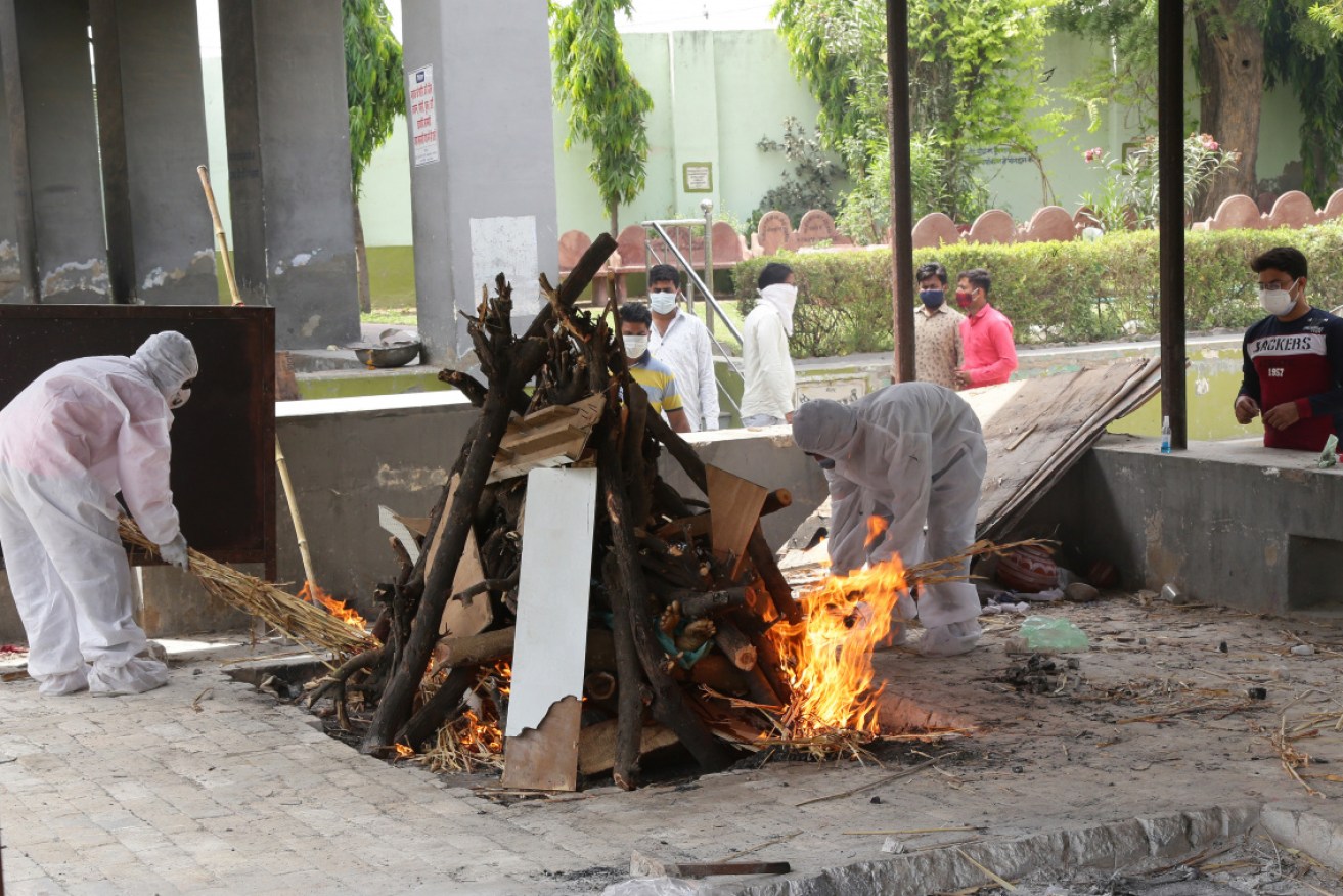 Funeral cremations in India have stepped up as the virus takes a heavy toll.  