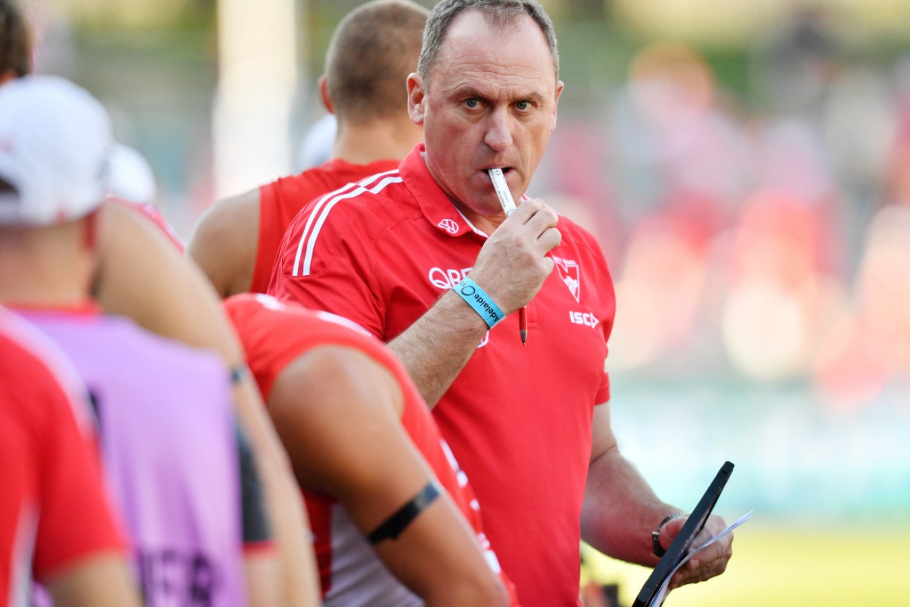 Swans coach John Longmire will be without key assistants this weekend. 
