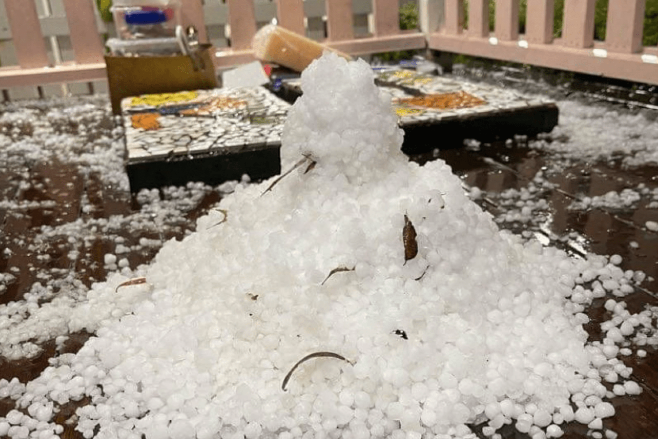 A pile of hail stacked up at a house at Centenary Heights.