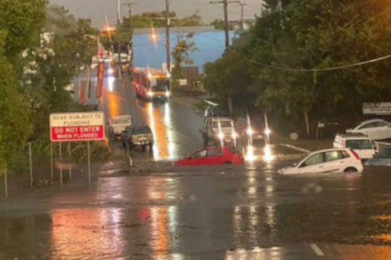 Flooded Station Road at Yeerongpilly on Brisbane's southside on Wednesday evening.