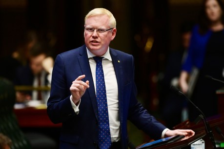 Charged MP suspended from NSW parliament