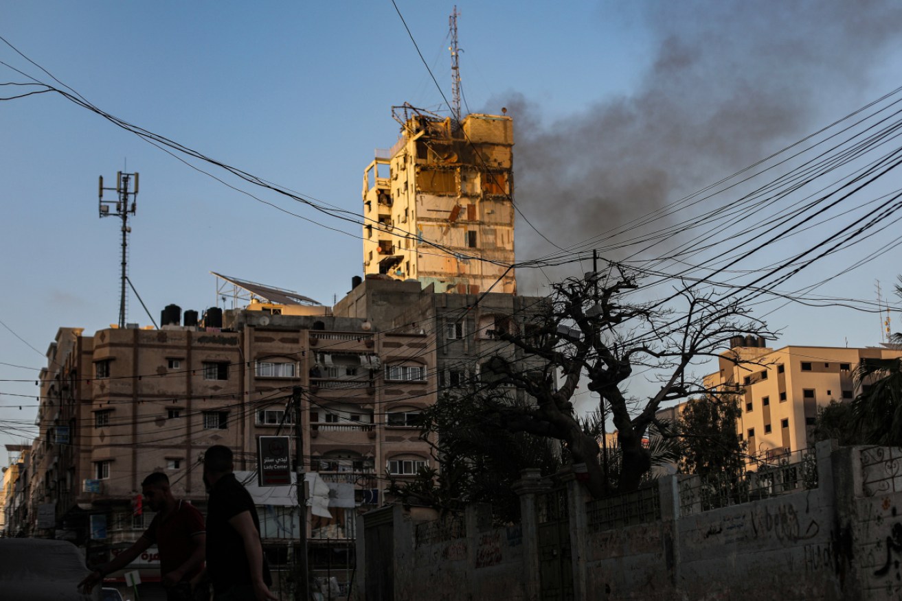 The Al Shrouq building in central Gaza, which hosts offices for media outlets and companies, was destroyed during Israeli airstrikes on Wednesday.