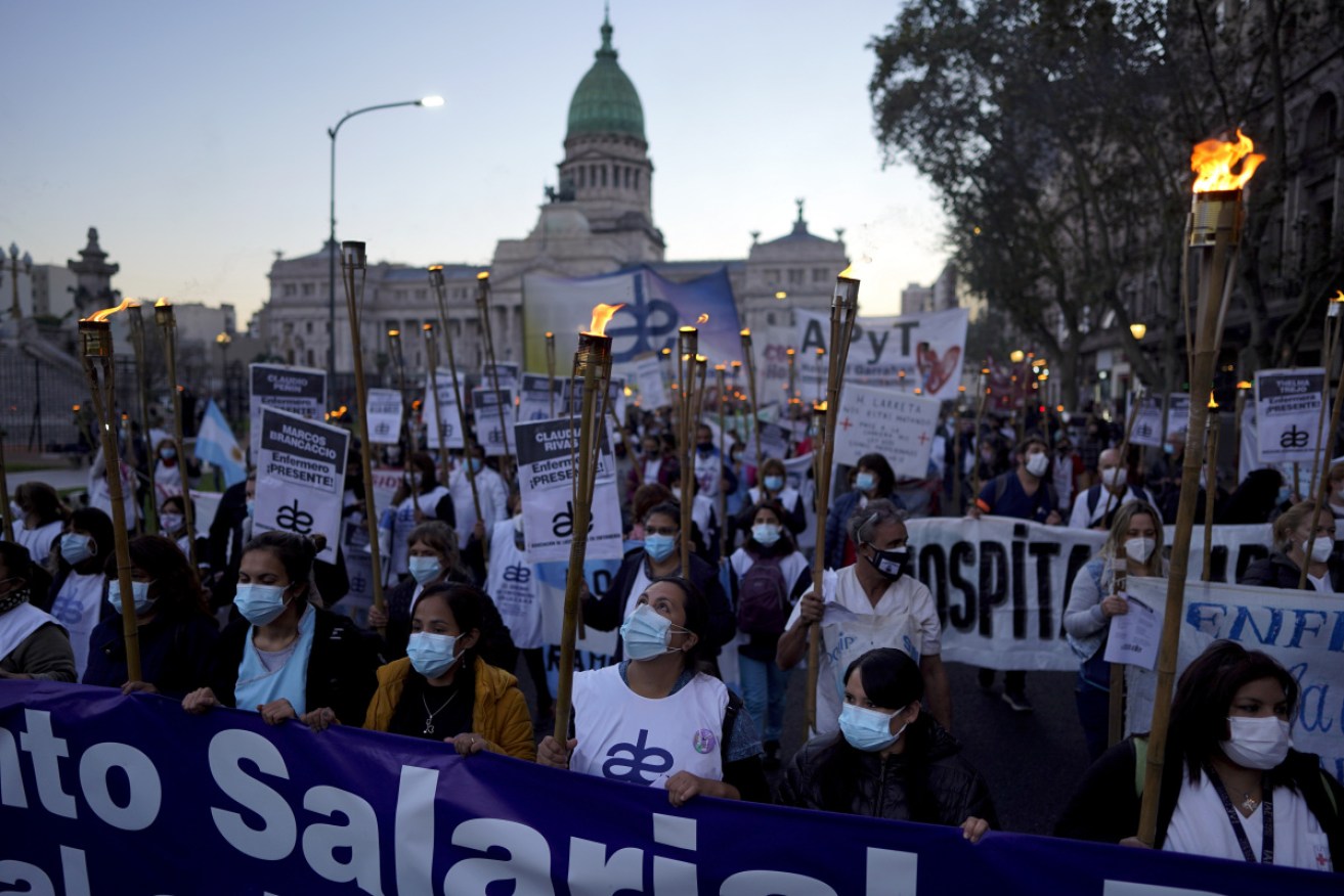 Nurses march in Buenos Aires for improved working conditions amid the latest coronavirus wave.