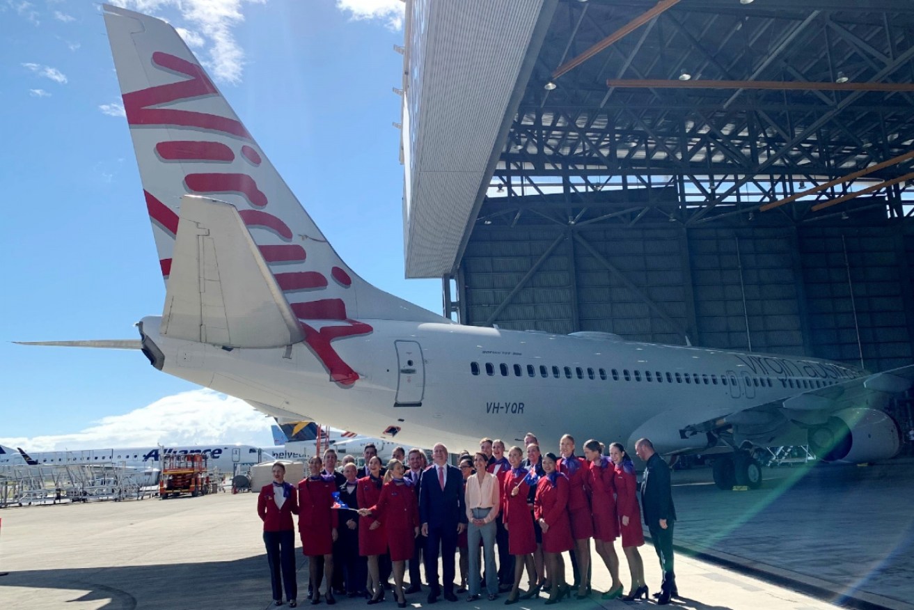 Virgin Australia CEO Ms Hrdlicka and Deputy Prime Minister Mr McCormack with Virgin staff in Brisbane today.