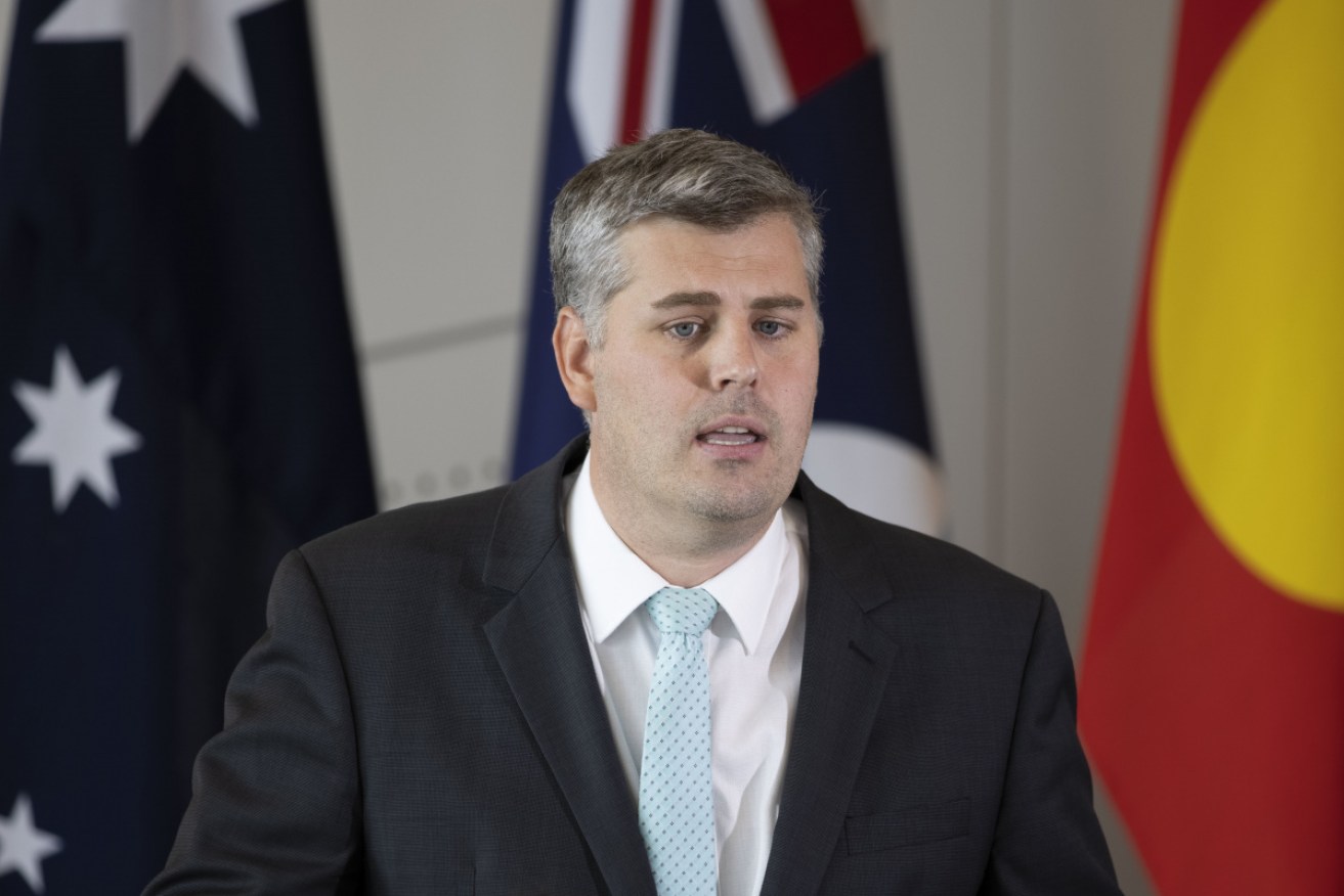 Queensland Minister Mark Ryan told a cameraman he "might have to get a restraining order out".