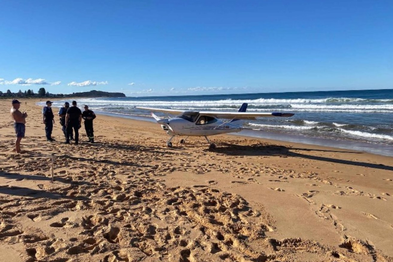 Police at the scene of the plane landing at Collaroy on Sydney's northern beaches.