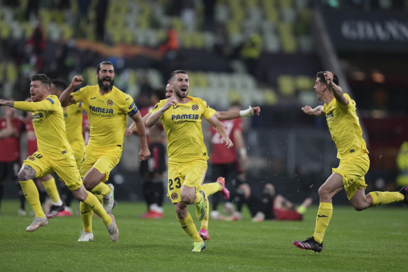 Villarreal players celebrate their Europa League final win over Manchester United.