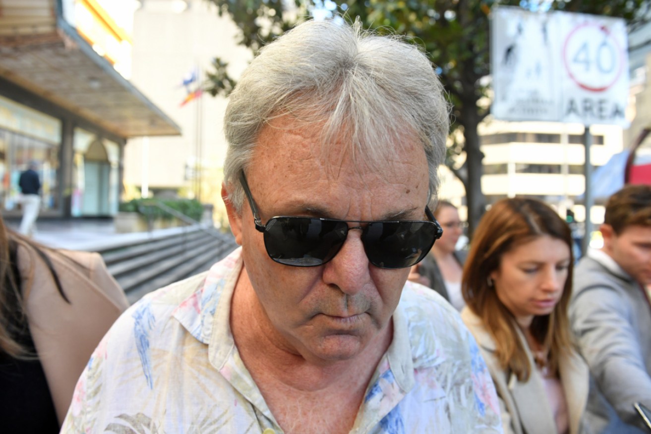 Peter Forster will hand himself into Queensland police to fight fraud charges, his lawyer says.