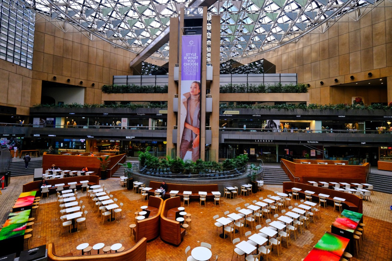 Empty dining tables at Collins place in Melbourne as Victorians endure their fourth lockdown in 15 months.