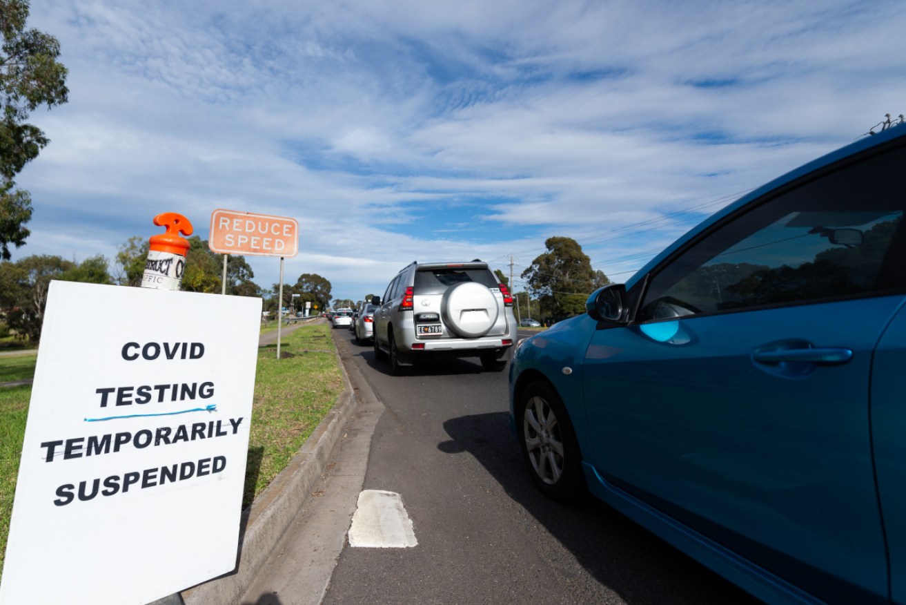 A COVID testing centre in Melbourne's west puts out the closed sign after being overwhelmed with queues.
