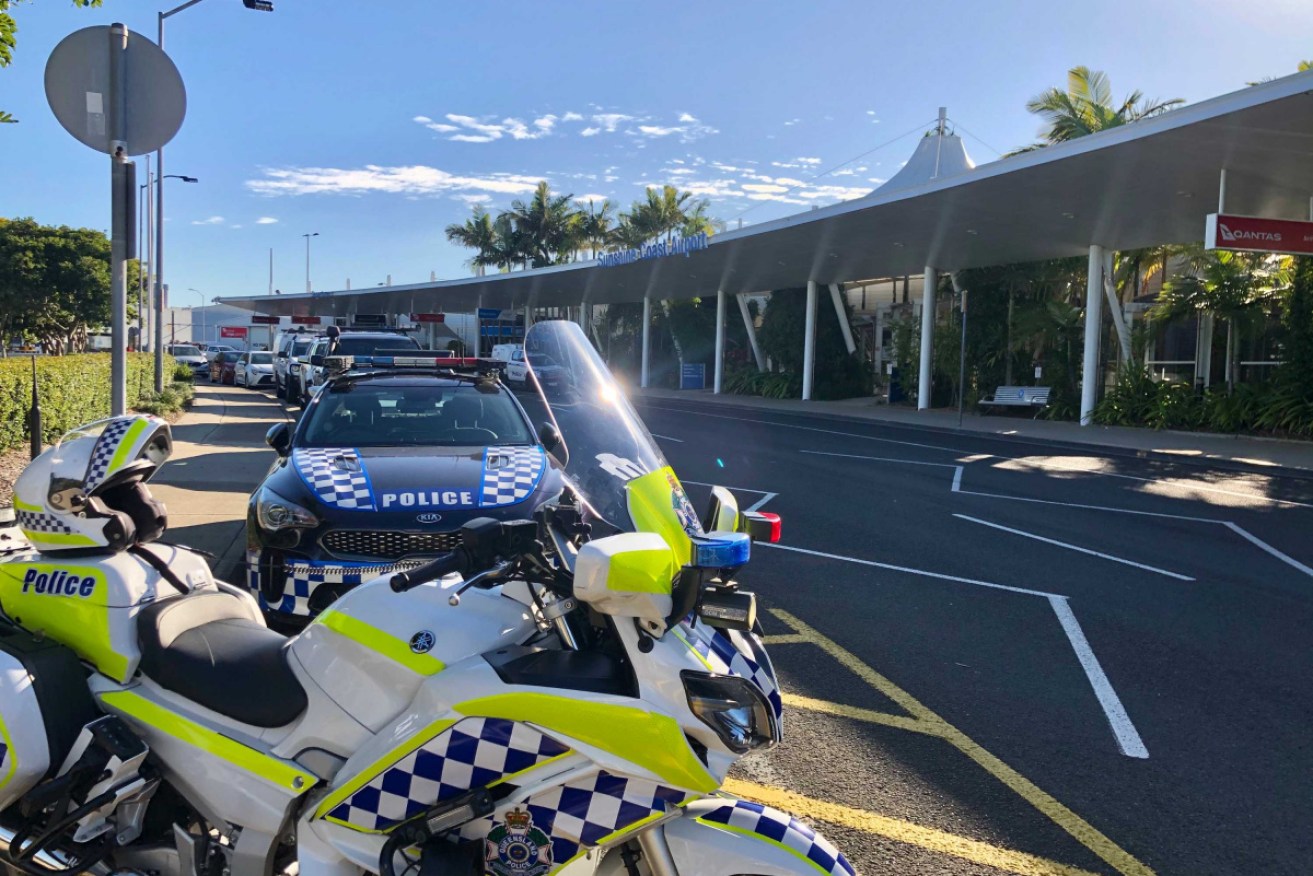 Police are scrutinising travellers' movements as they arrive into the Sunshine Coast Airport in order to keep the community safe, but some say they're going too far.