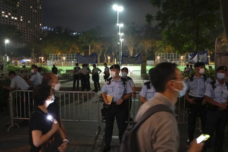 Hundreds hold Hong Kong candlelight vigil despite ban