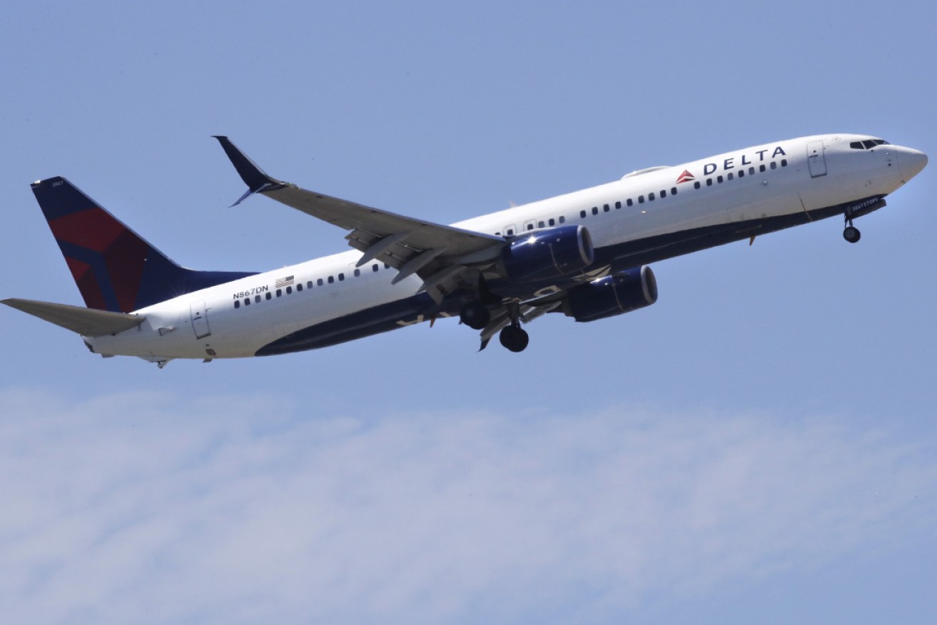 A Delta flight landed safely in Albuquerque after being diverted due an "unruly" passenger. 