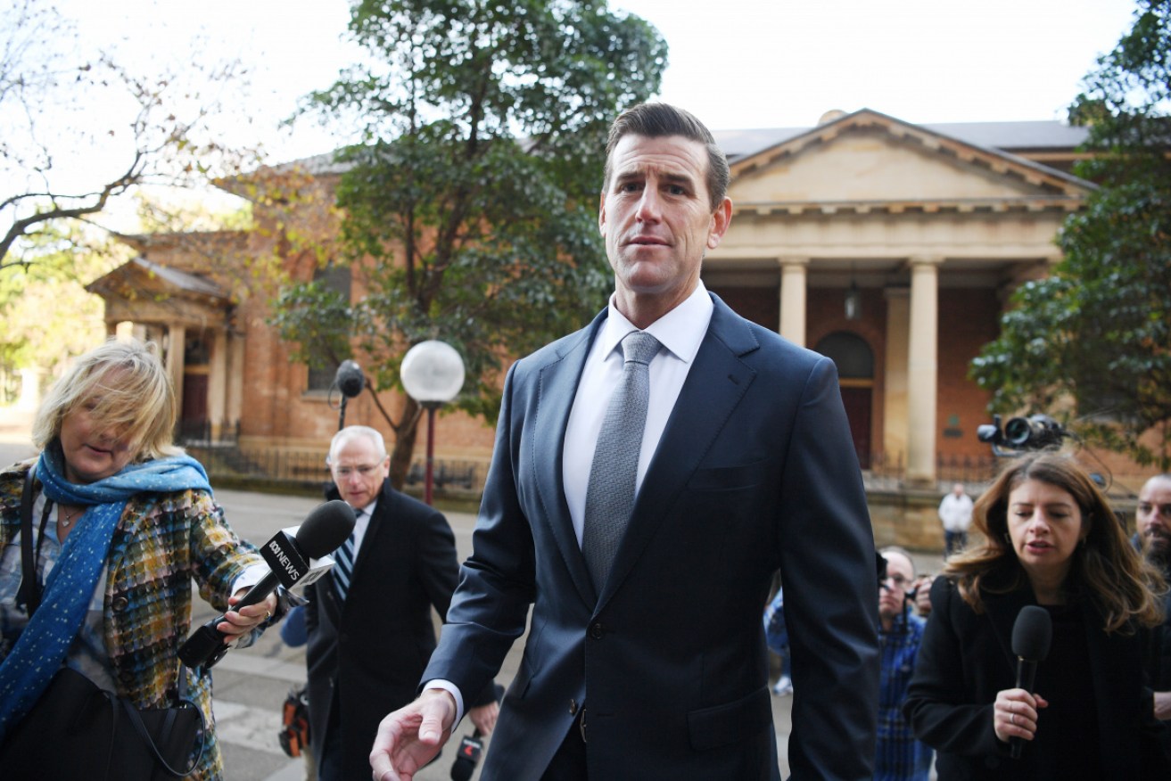 A former comrade says Ben Roberts-Smith threatened to strangle a man with his bare hands.