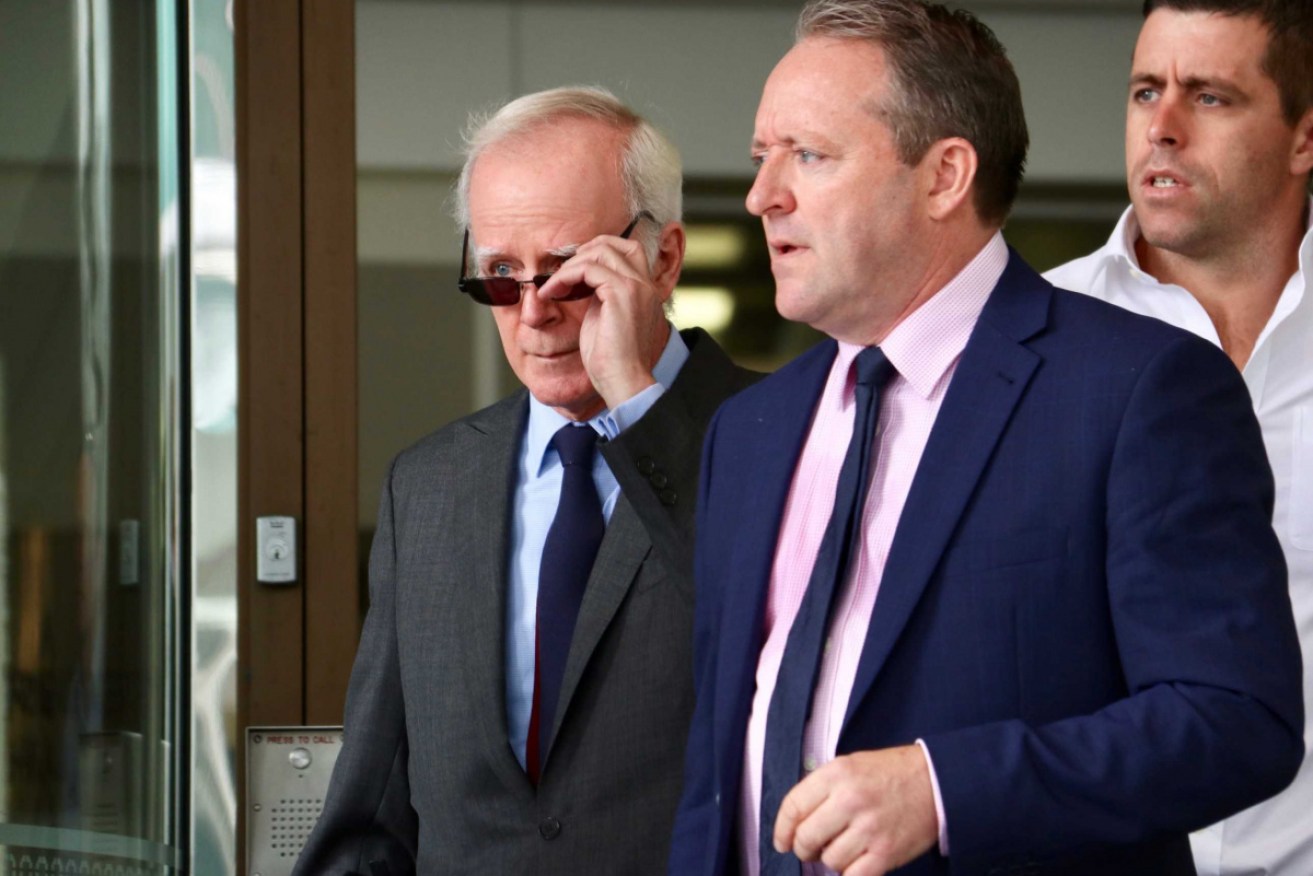 Father Joseph Walsh (left) faced trial in Perth last year but the charges were eventually dropped.