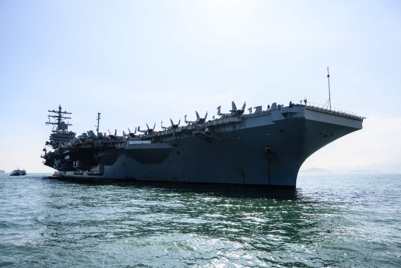 The USS Ronald Reagan, seen here in Hong Kong in 2018, is leading the navy ships.