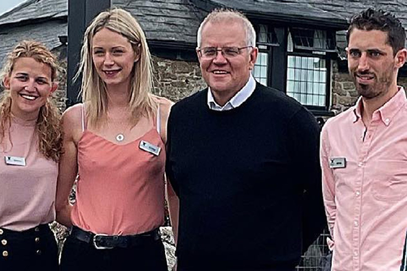 Mr Morrison smiling with staff on his visit to the Jamaica Inn in Cornwall.