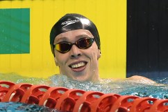 Chalmers secures 100m freestyle title defence