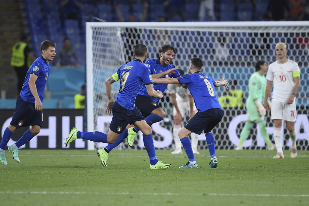 Manuel Locatelli celebrates one of his two goals in Italy's Euro 2020 win over Switzerland.