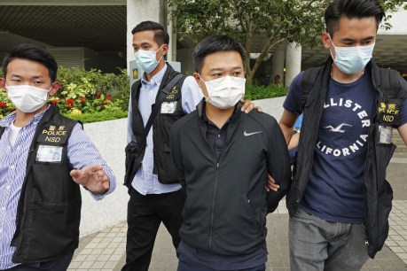 Hong Kong police arrest five newspaper executives