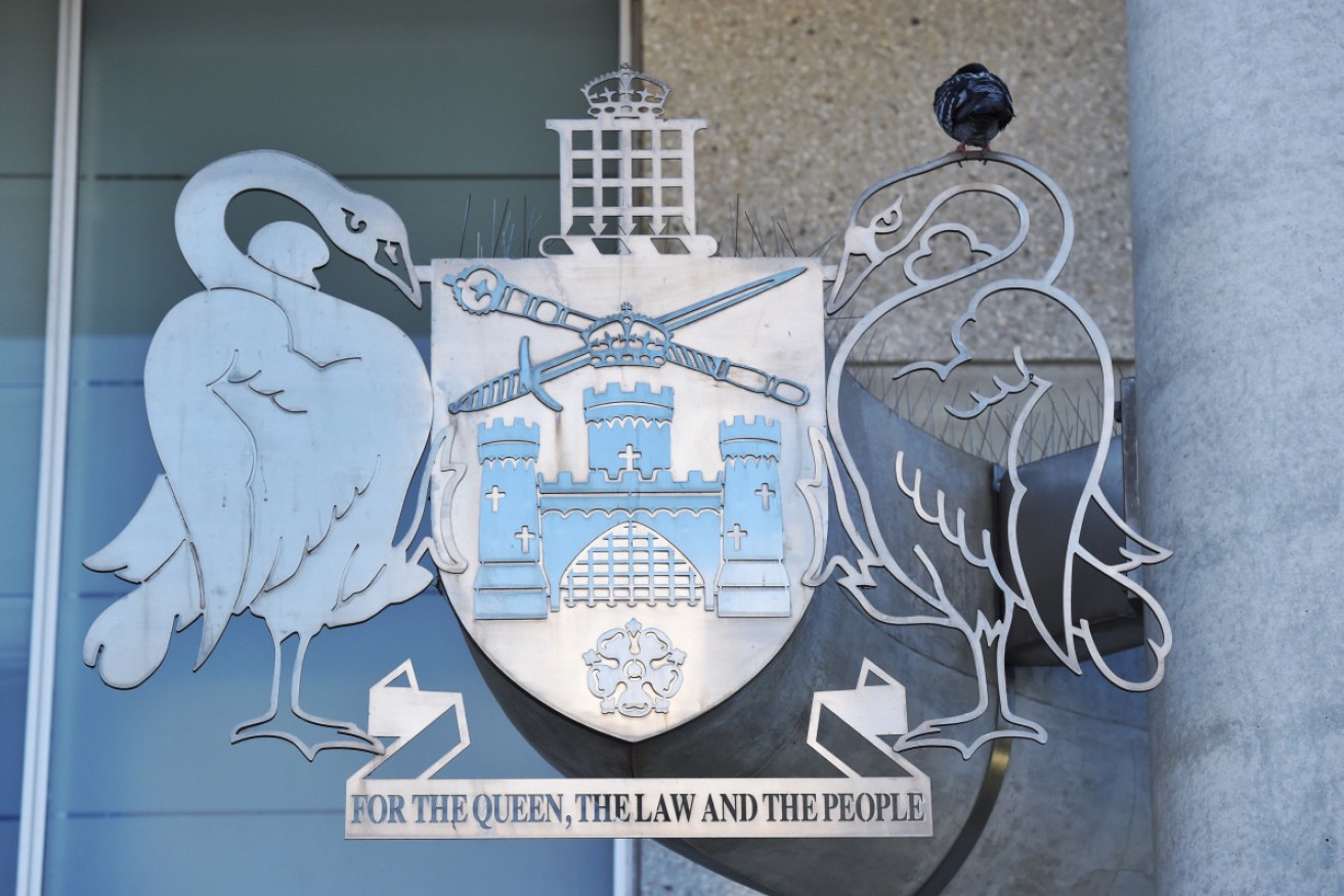 A former spy who exposed a bugging scandal in East Timor has been handed a suspended sentence.
