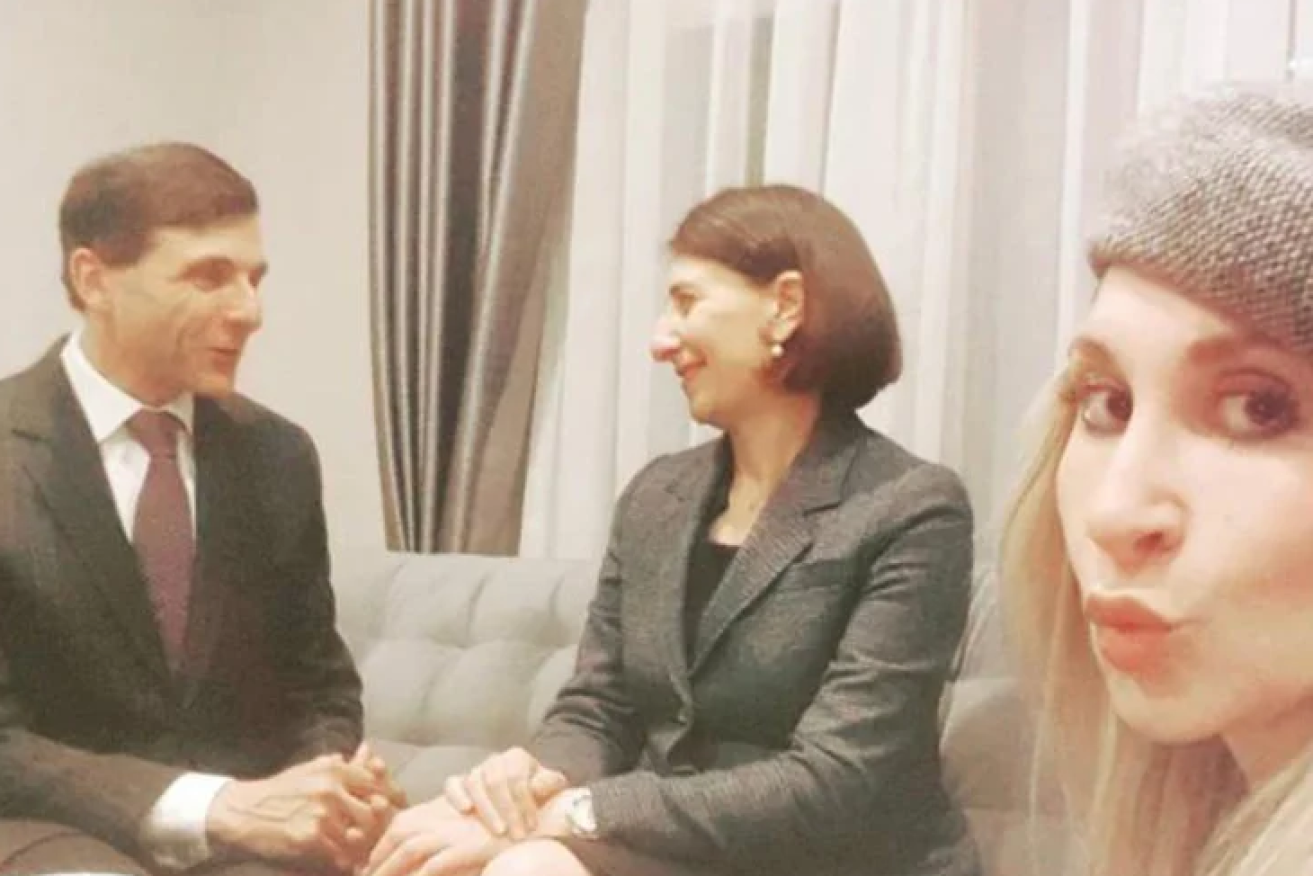 Gladys Berejiklian and her lawyer beau Arthur Moses share a tender moment .
