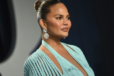 Chrissy Teigen insists bullying messages are fake