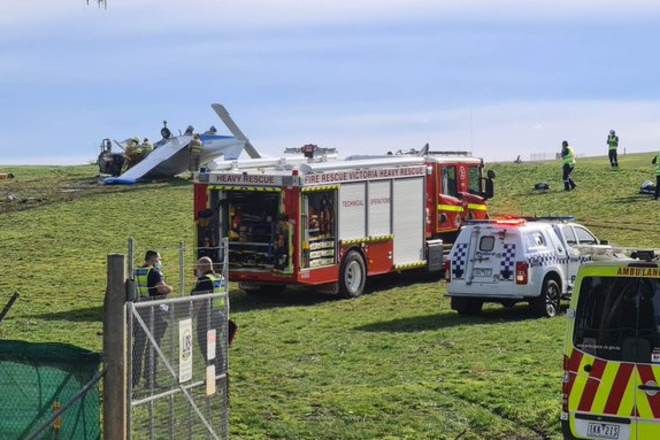 Eyewitnesses reported seeing one person carried on a stretcher from the light plane, which landed upside down.