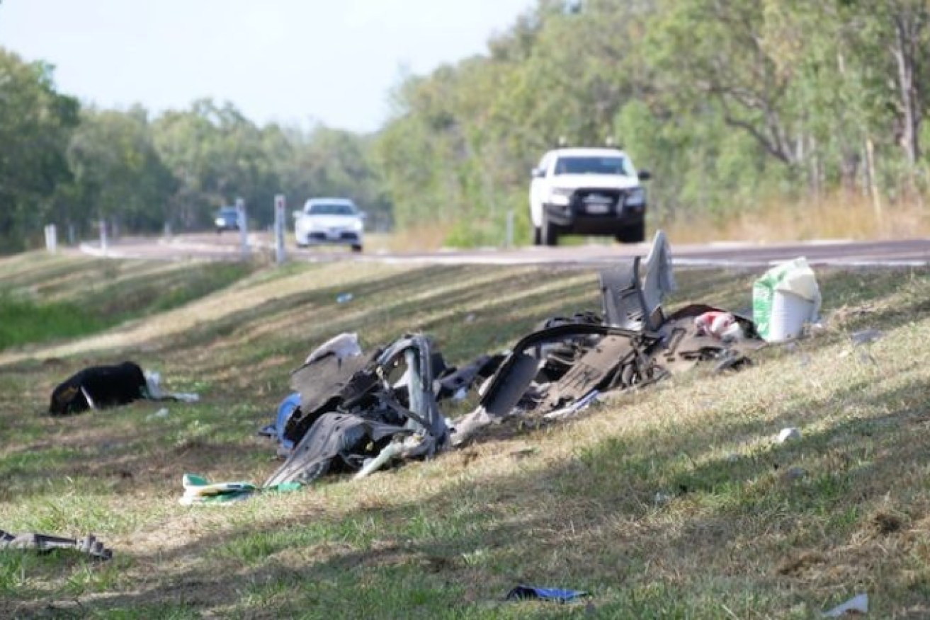 The wreckage of a car in the aftermath of two fatal accidents on the Bruce Highway, north of Townsville.