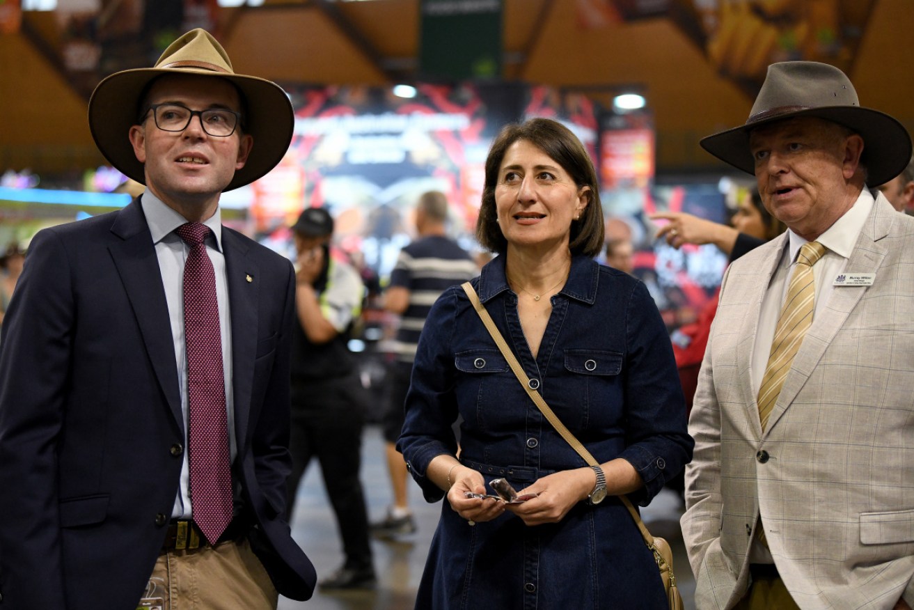 Mr Marshall with Premier Gladys Berejiklian in April. He has reportedly been diagnosed with the coronavirus.
