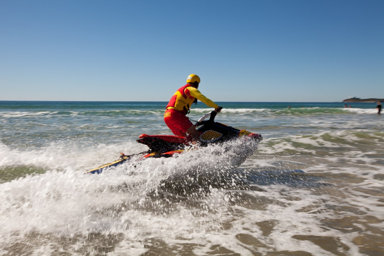 Lifeguards had been helping to search for the missing diver off North Stradbroke Island.(