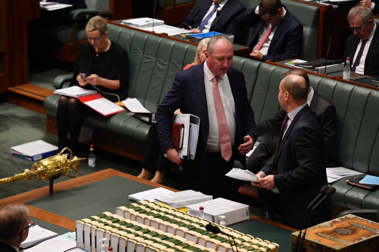Deputy Prime Minister Barnaby Joyce arrives late to question time on Thursday.