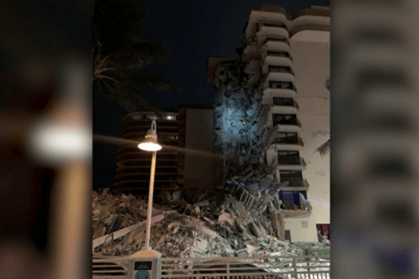 Body hunt suspended at collapsed Florida tower as demolition team take charge