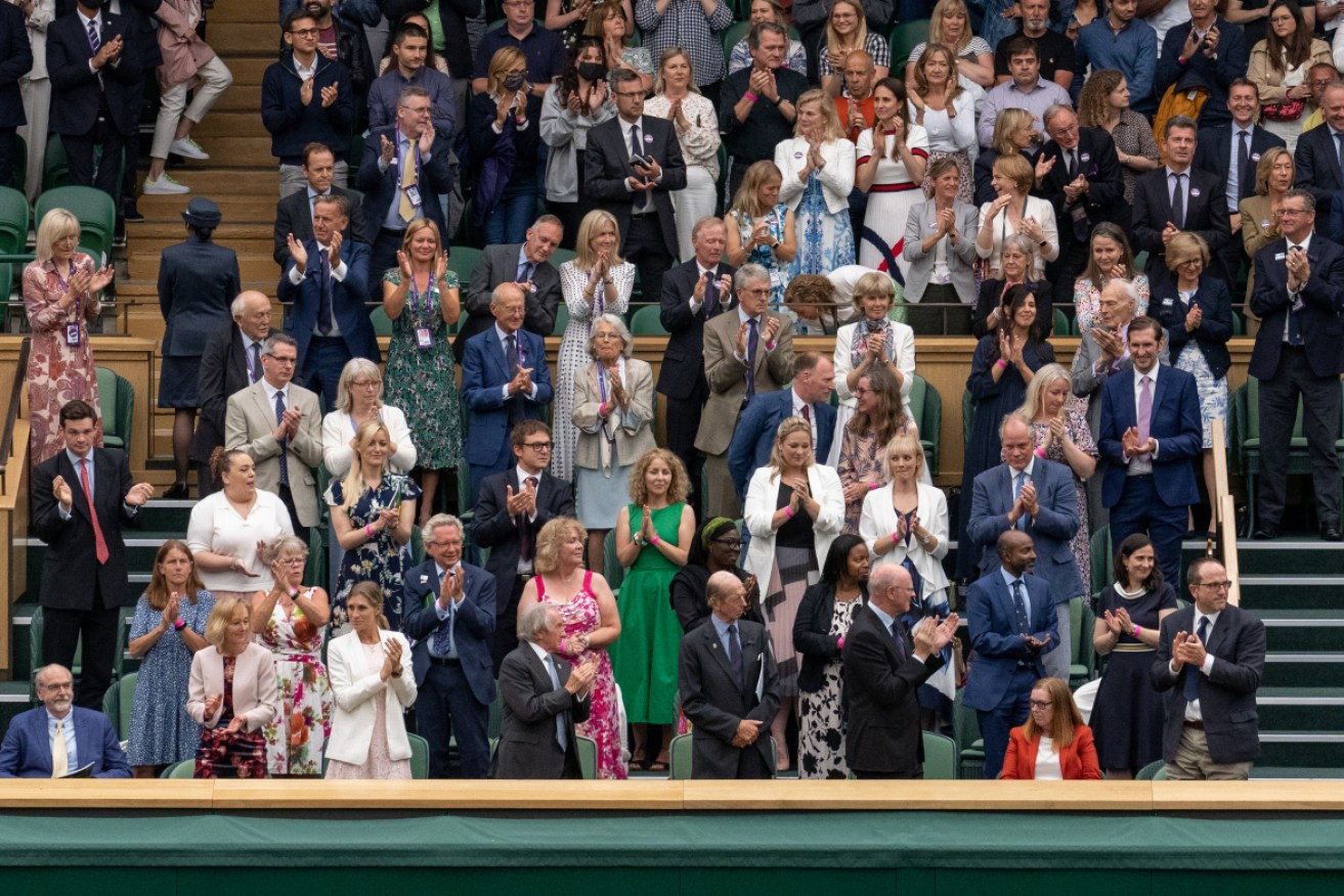 Other guests in the royal box also applauded Dame Sarah Gilbert (seated, in red).